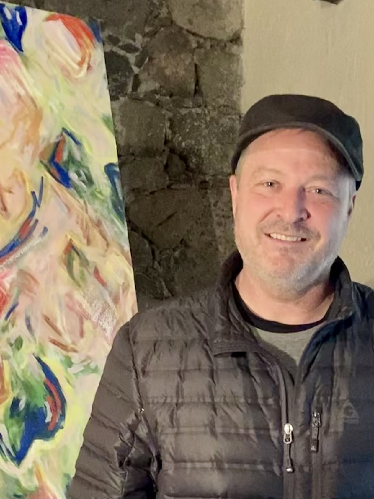Richard Lubben with painting